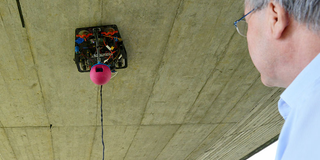 Illustration for article titled This Robotic Bridge Inspector Was Originally a Disney Camera-Bot